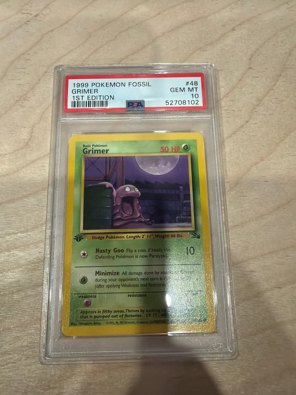 PSA 10 1999 Pokemon Grimer 1st Edition Fossil